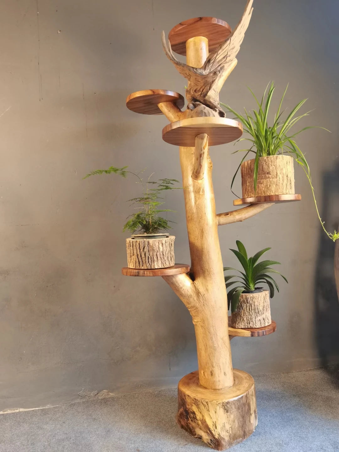 A rustic wooden cupcake display stand with a botanical pattern and no rust for wedding fruit platters and food trays